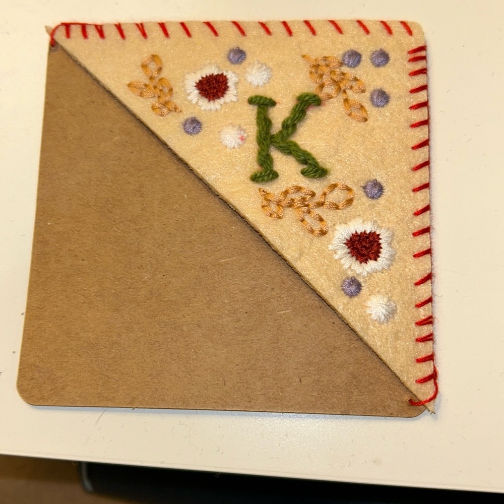 Hand Embroidered Corner BOOKMARK with “K” initial with flower detail